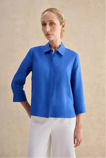 A woman wearing a Hobbs dress.