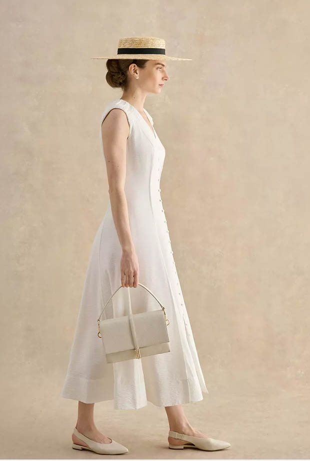 A woman wearing Hobbs dress.