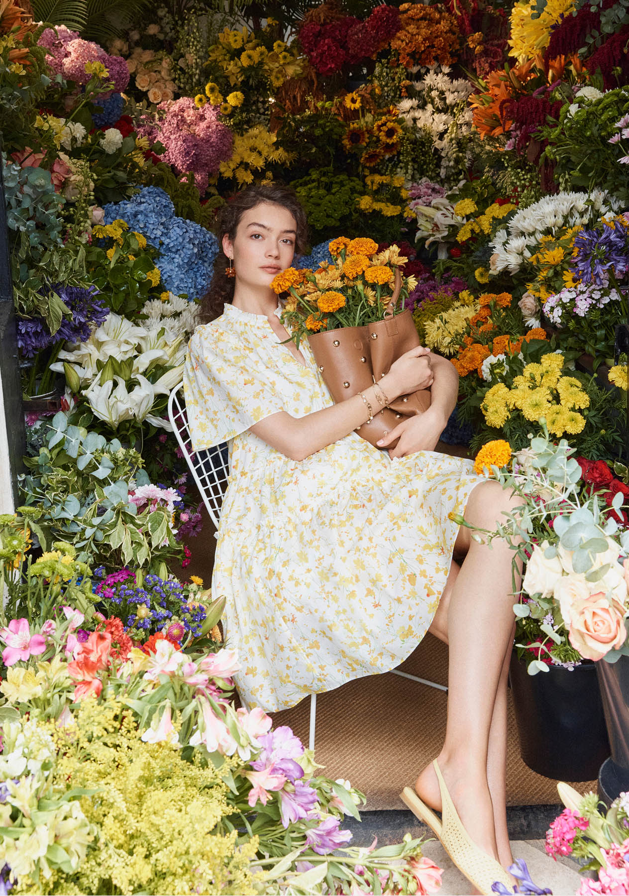 Model photographed in a floral dress.