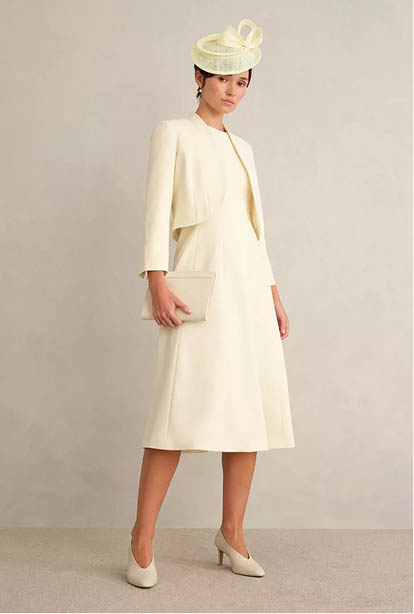 A woman wearing a Hobbs dress.