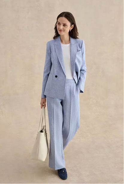 A woman wearing a Hobbs dress.