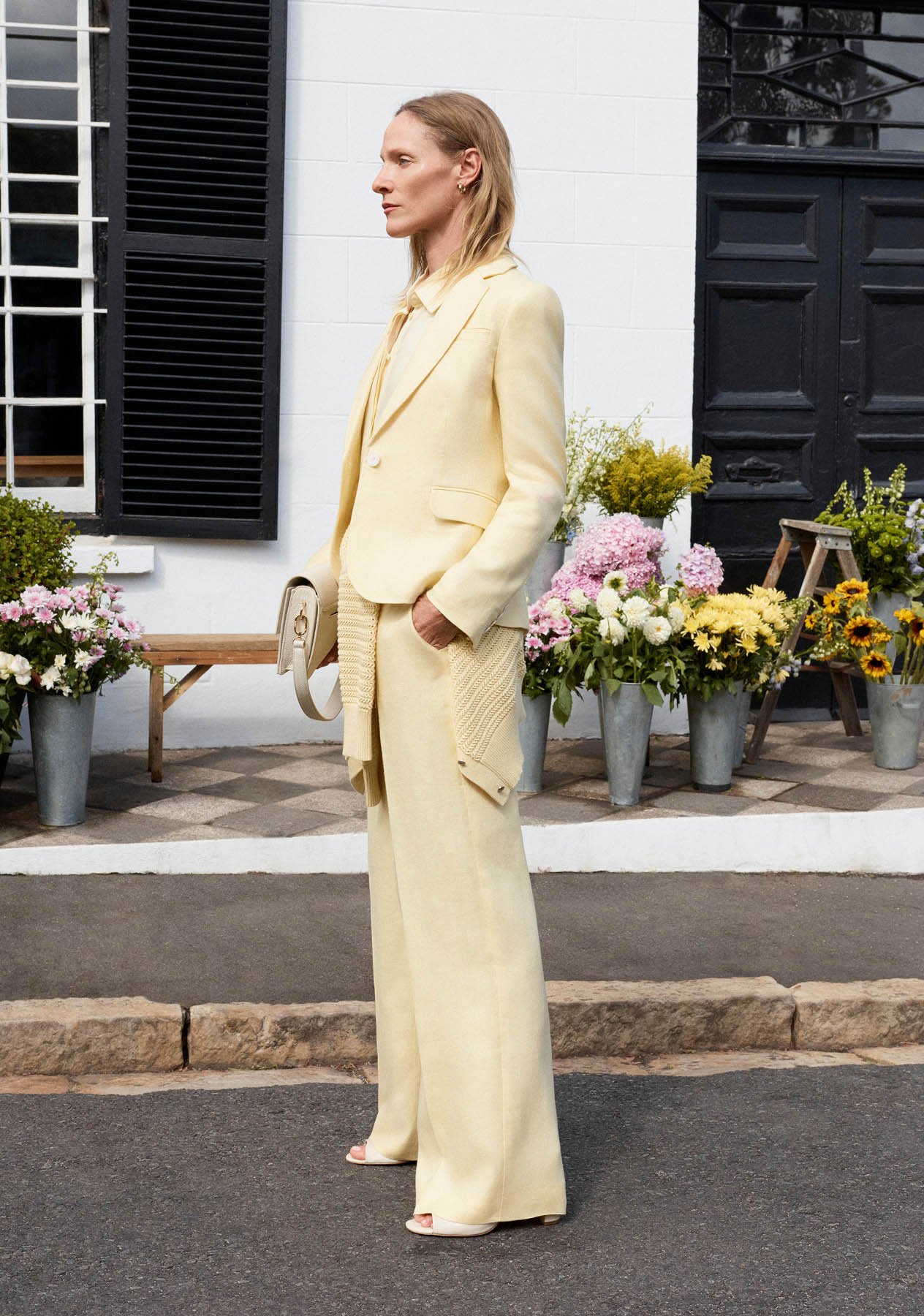 Women wearing Hobbs’ butter yellow edit.