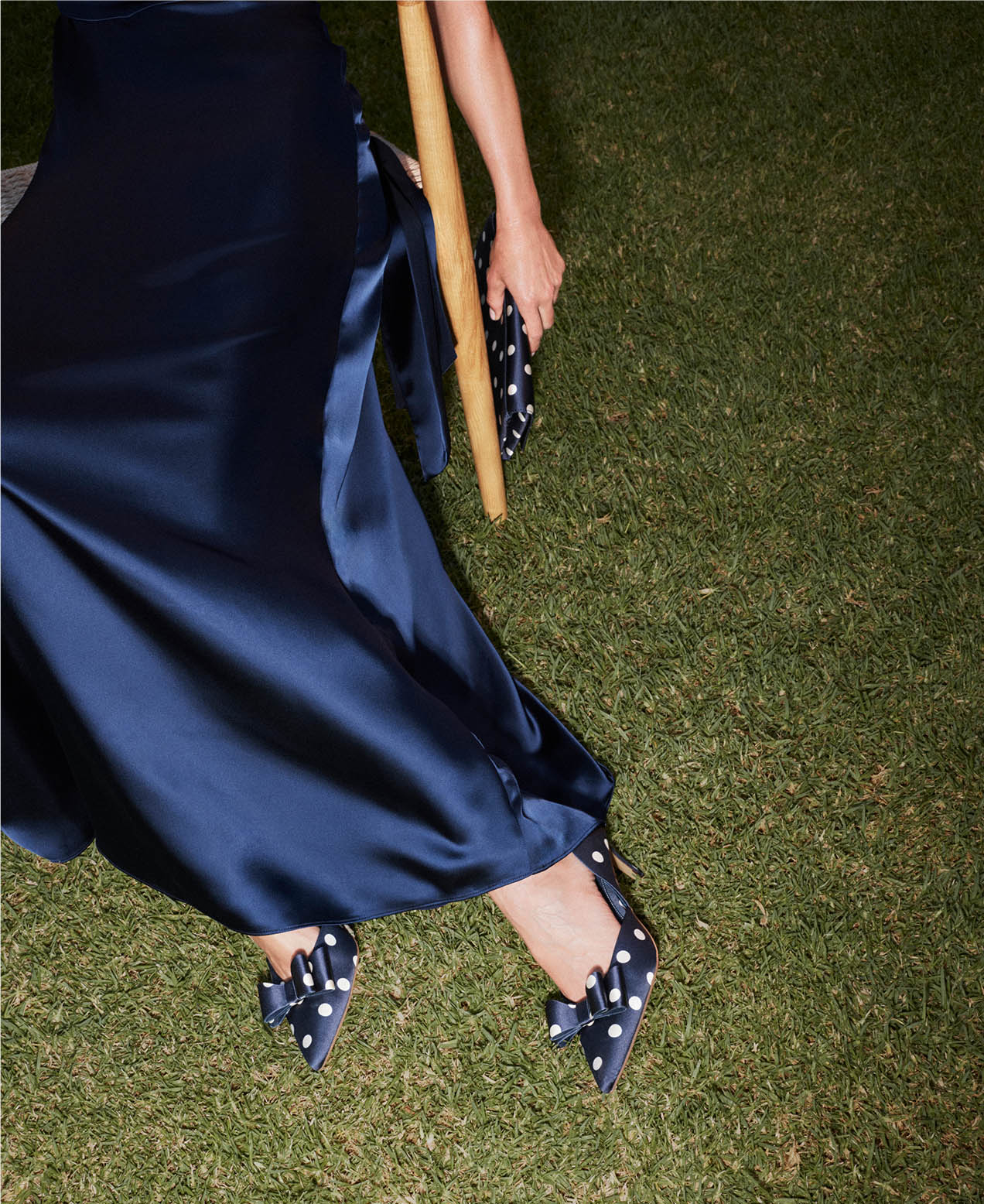 A woman showcasing Hobbs’ occasion accessories.