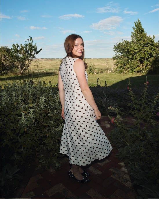 A woman wearing a Hobbs dress.