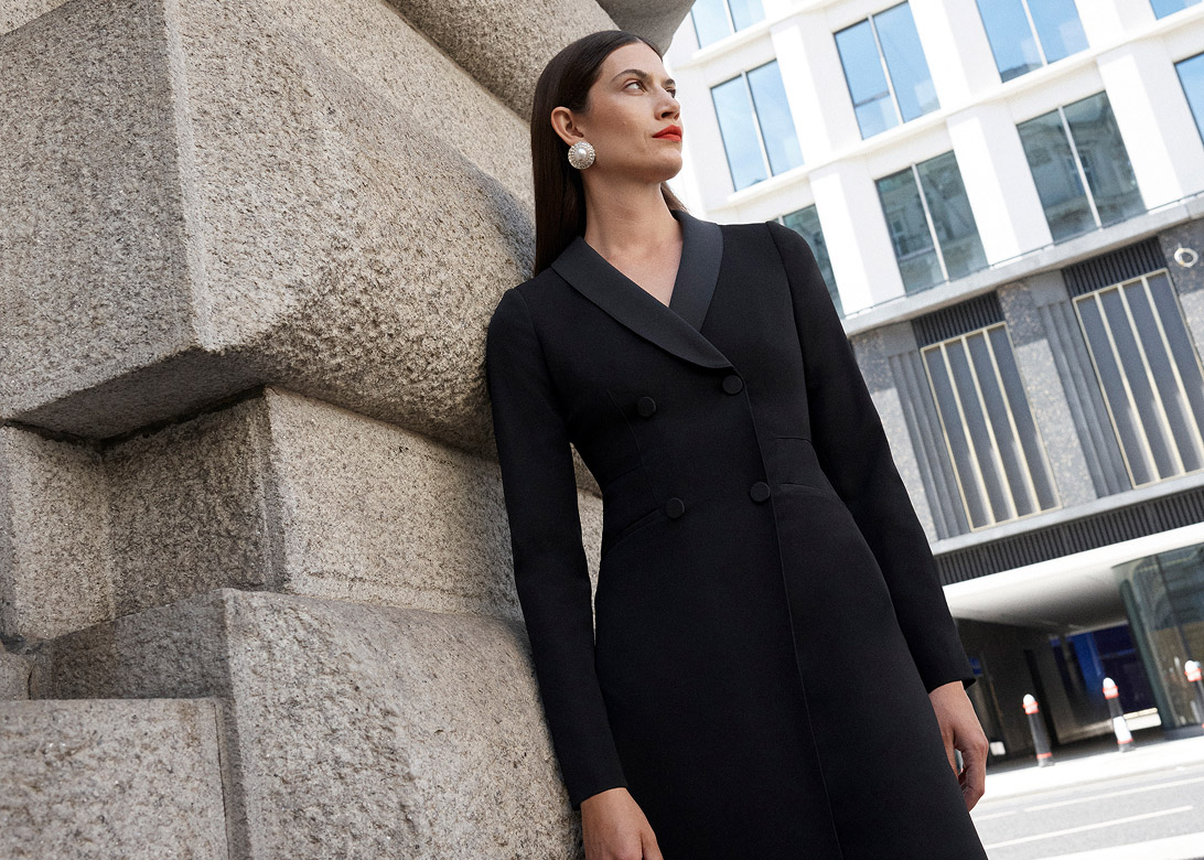 Model photographed with a black dress.