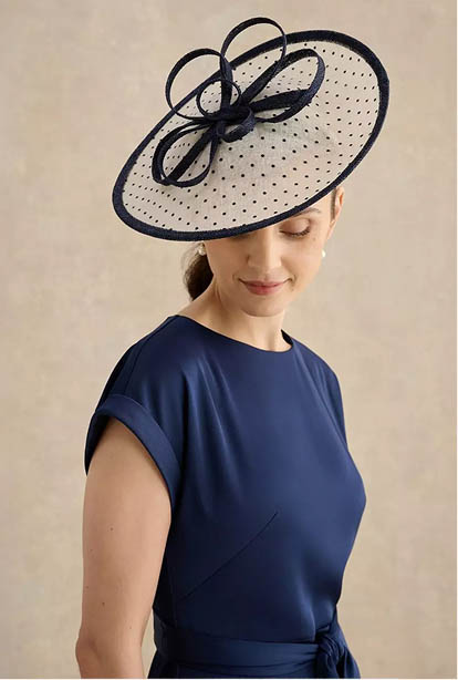 A woman wearing a Hobbs dress.