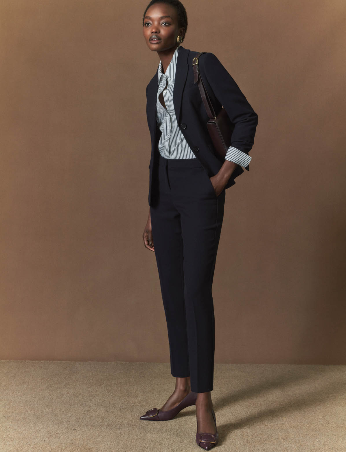 HOBBS MODEL WEARING NAVY MATCHING SUIT