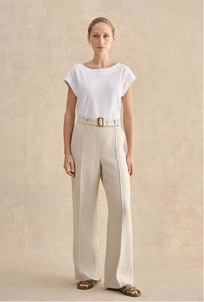 A woman wearing a Hobbs dress.