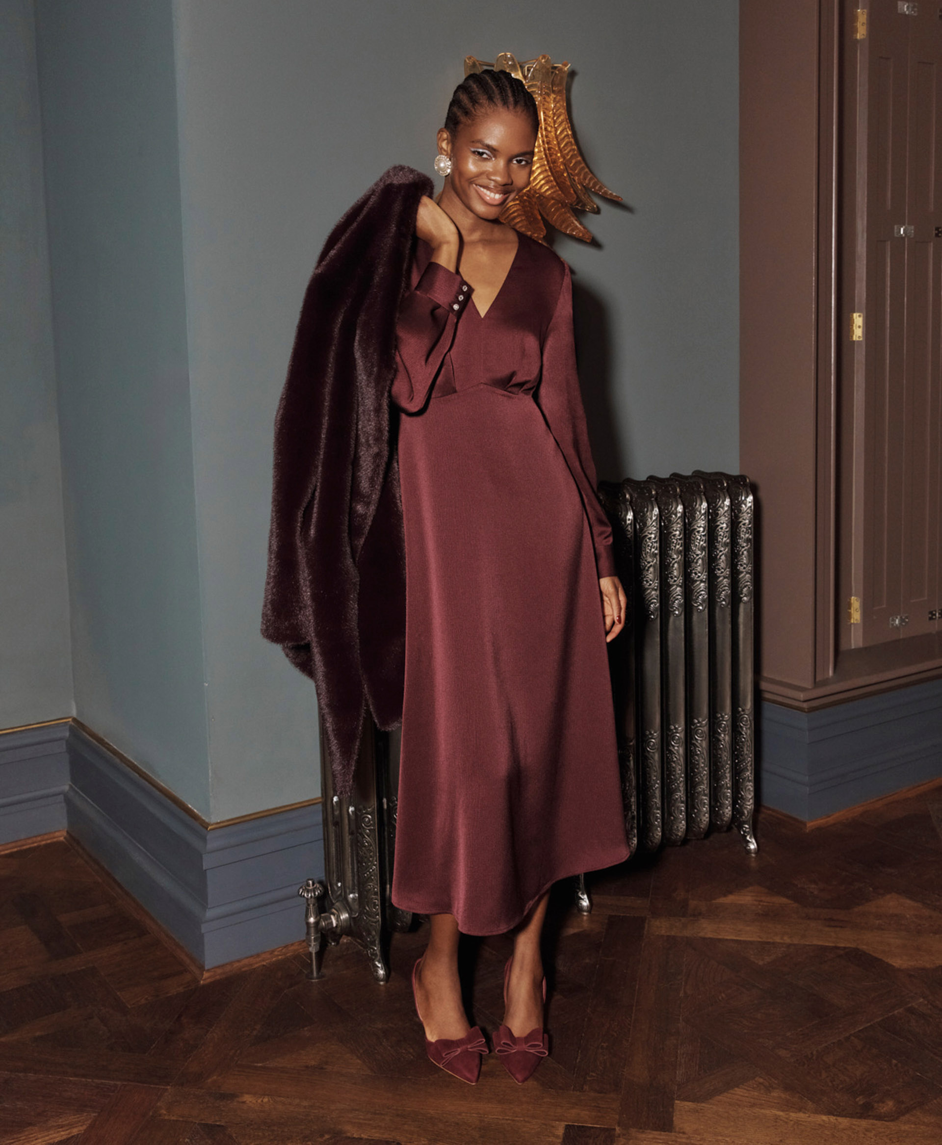 Women wearing formal Christmas party outfits.