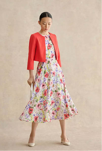 A woman wearing a Hobbs dress.