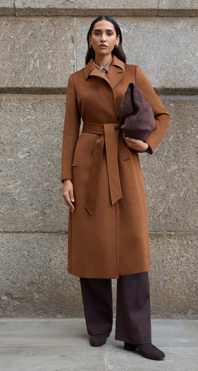 A woman wearing a Hobbs wool coat.