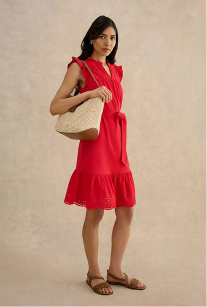 A woman wearing a Hobbs dress.