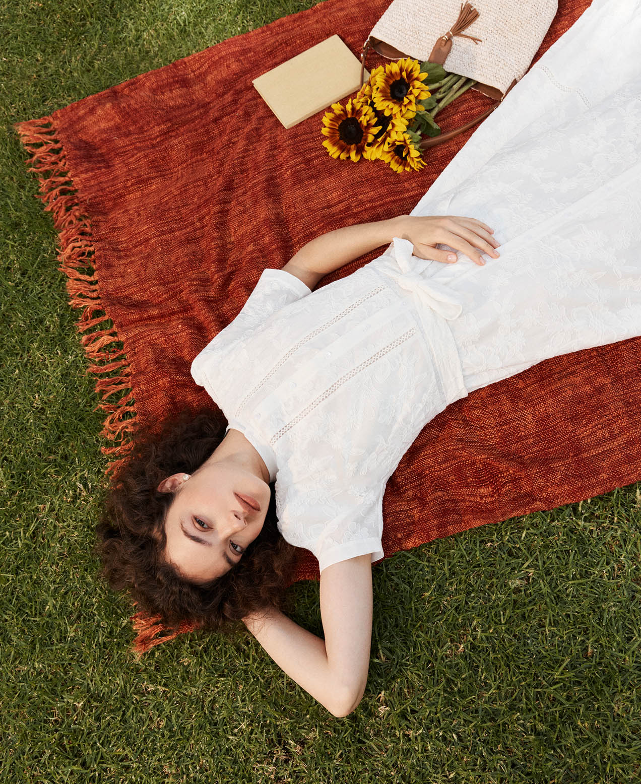 A woman wearing a Hobbs summer dress