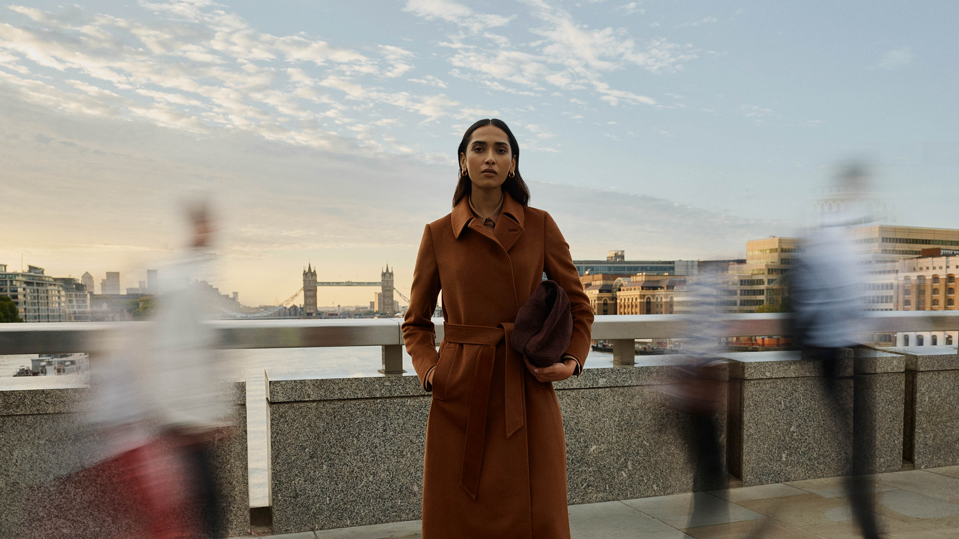 Women wearing Hobbs outerwear.