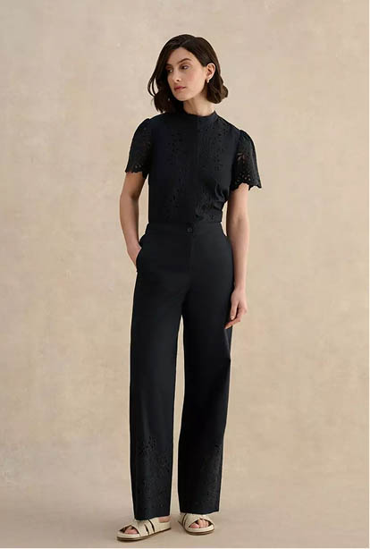 A woman wearing a Hobbs dress.