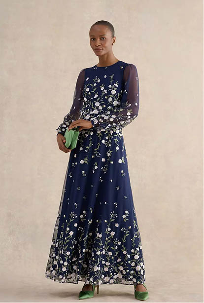 A woman wearing a Hobbs dress.