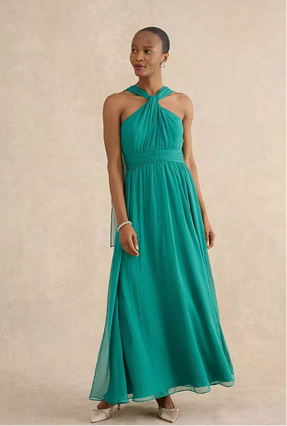 A woman wearing a Hobbs dress.