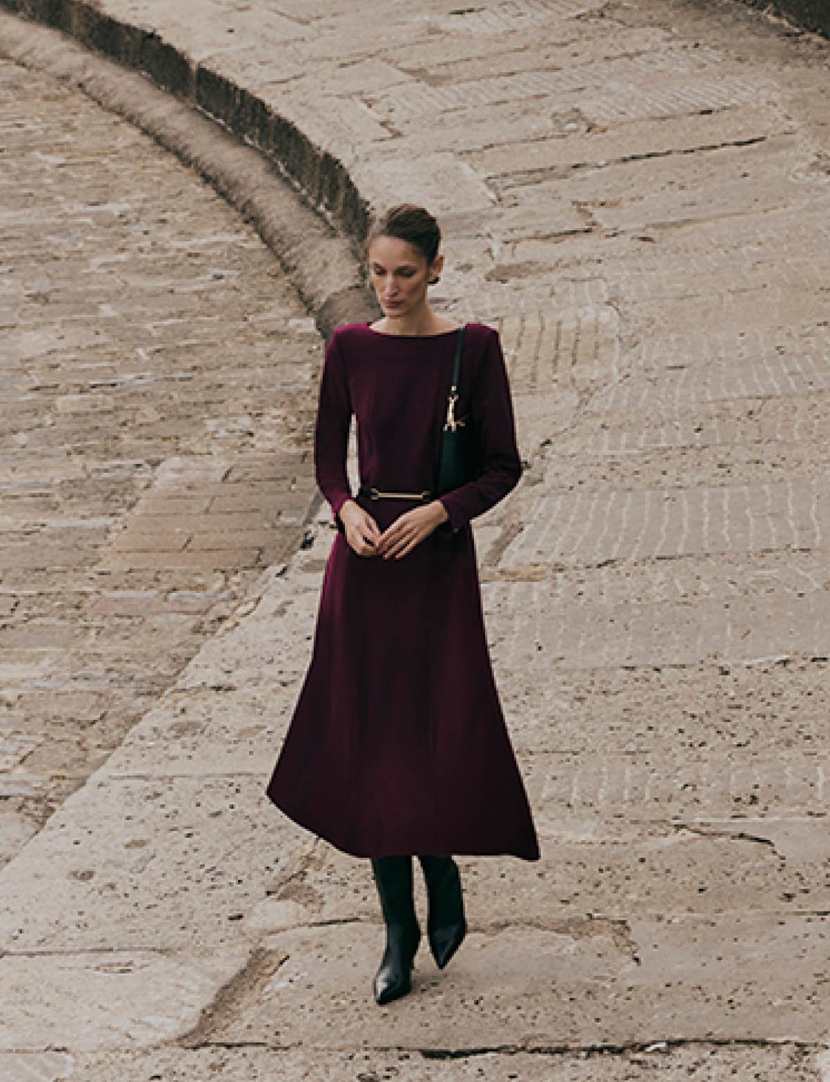 HOBBS MODEL WEARING TAILORED DRESS IN PLUM