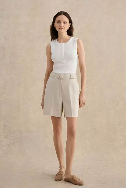 A woman wearing a Hobbs dress.