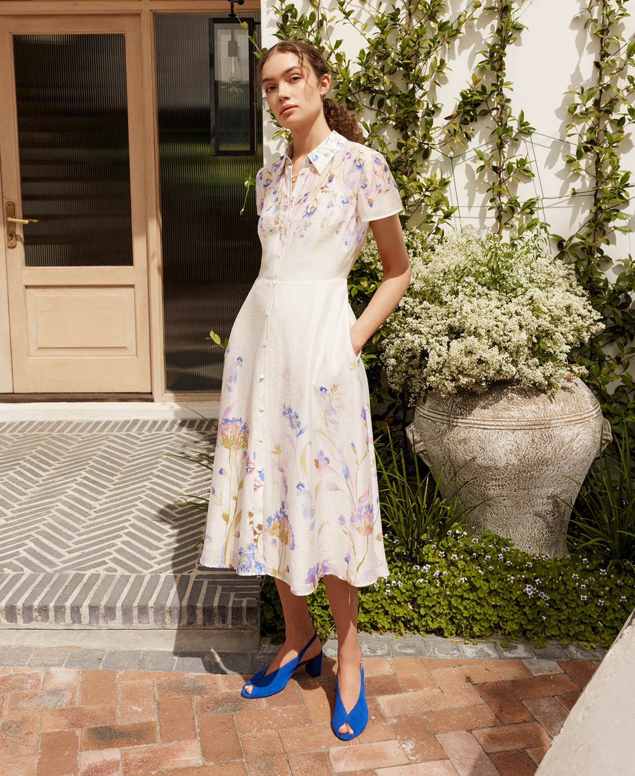 A woman wearing a Hobbs shirt dress