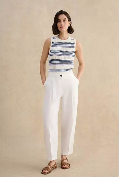 A woman wearing a Hobbs dress.