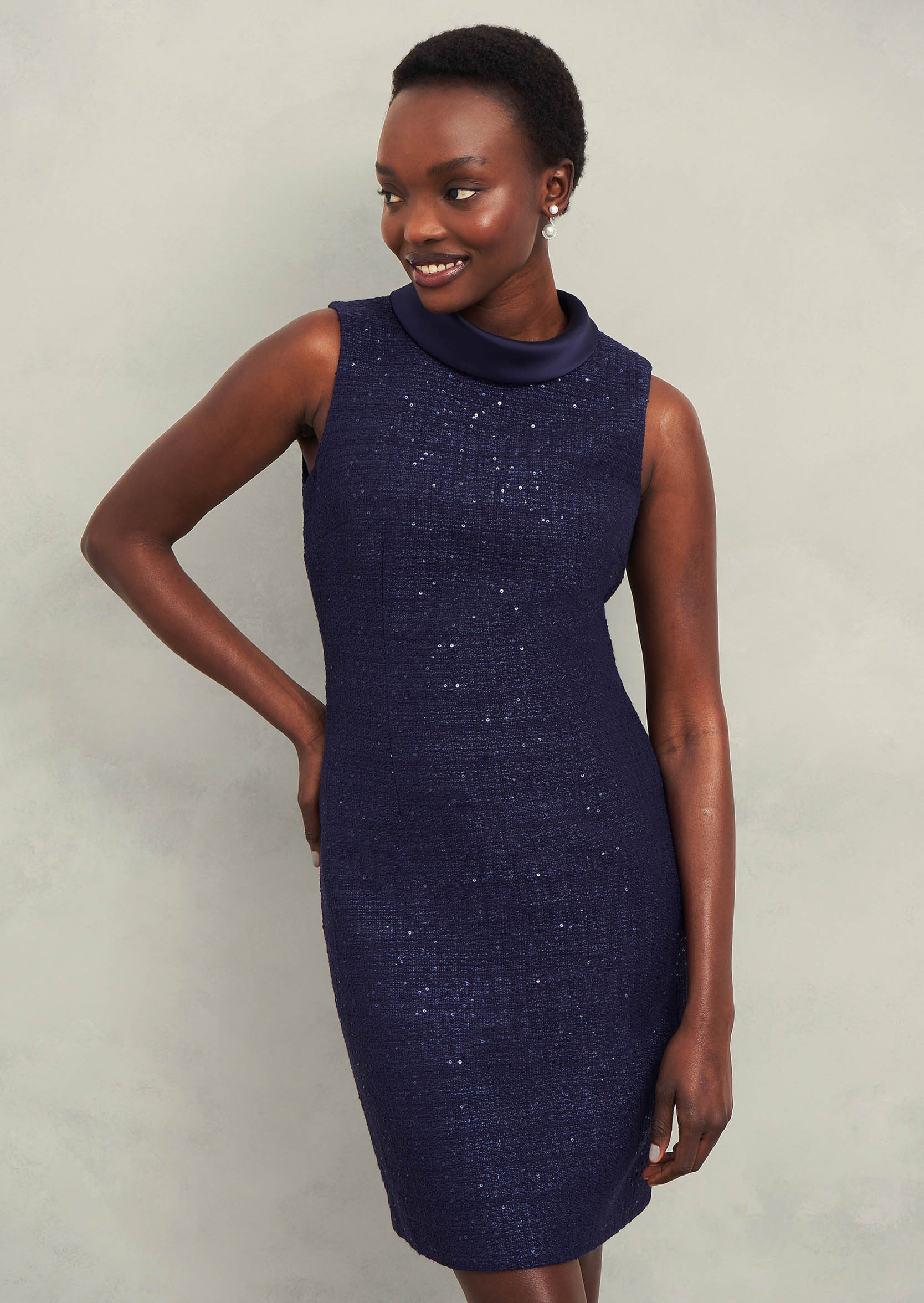 Gallery of two images of a model wearing a sequin coord.