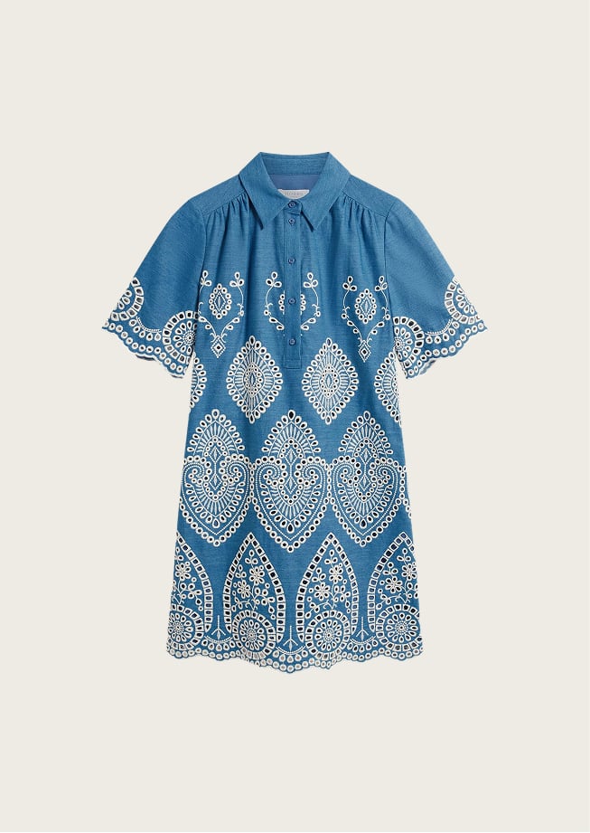 A woman wearing a Hobbs dress.